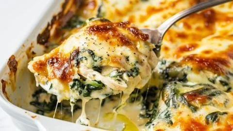 Cream Cheese Chicken and Spinach Casserole served in a baking dish.