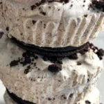 No-bake Oreo cheesecake bites with crushed Oreos and cream cheese topping