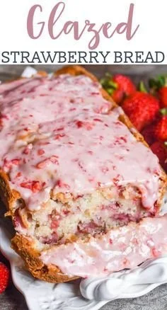Strawberry-glazed bread showcasing a vibrant glaze and fresh strawberries on top.