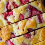 Freshly baked strawberry-lemonade quick bread with vibrant colors