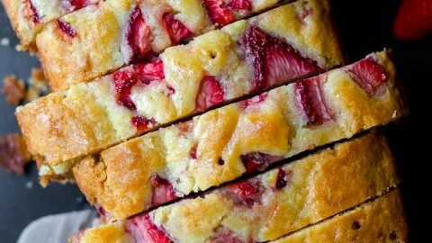 Freshly baked strawberry-lemonade quick bread with vibrant colors